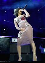 Cardi B Nearly Suffers a Nip Slip in Racy Photo from Bed ·