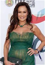 Unveiling Tia Carrere's Bikini Legacy: Discoveries and Insights